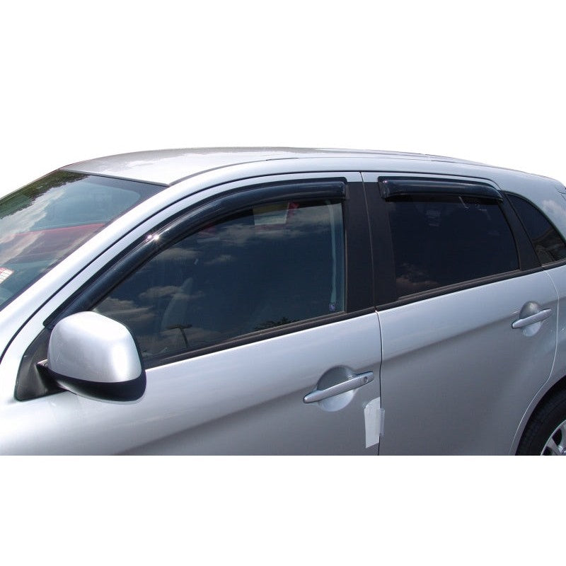 Four-piece set of AVS 94191 smoke-finish outside mount Ventvisor window deflectors for 2011-2013 Mitsubishi Outlander Sport.