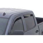 Four piece set of AVS In-Channel Ventvisor side window deflectors in dark smoke finish for Chevy and GMC trucks.