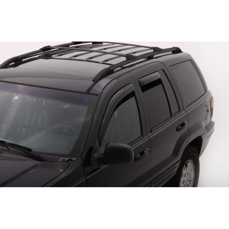 Four-piece set of dark smoke AVS In-Channel Ventvisor window deflectors for 1999-2004 Jeep Grand Cherokee.