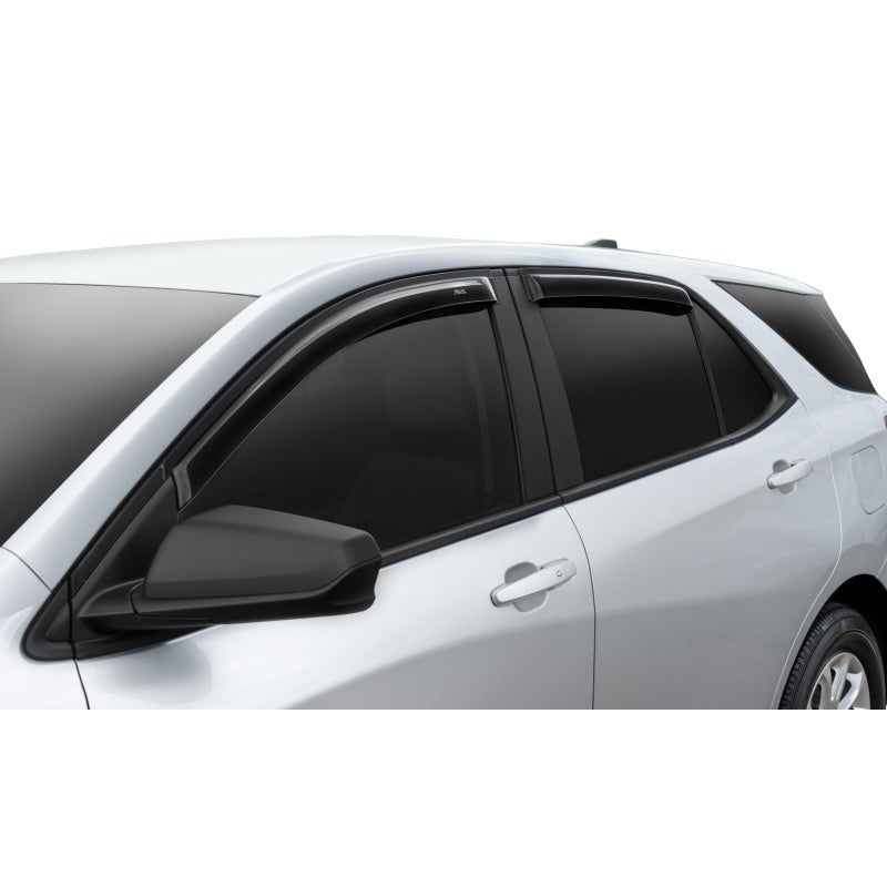 Four smoke-tinted AVS Ventvisor window deflectors for outside mounting on a 2018-2024 Chevrolet Equinox.
