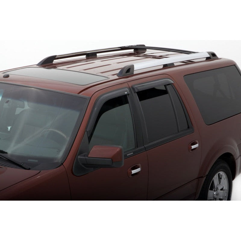 Four-piece set of AVS smoke-tinted acrylic outside mount window deflectors for 1997-2018 Ford Expedition and Lincoln Navigator.