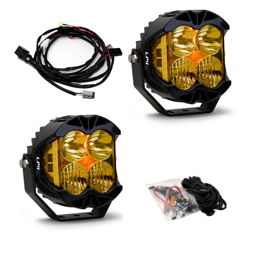 Baja Designs LP4 Pro LED pods with amber lenses and black aluminum housings for off-road driving.