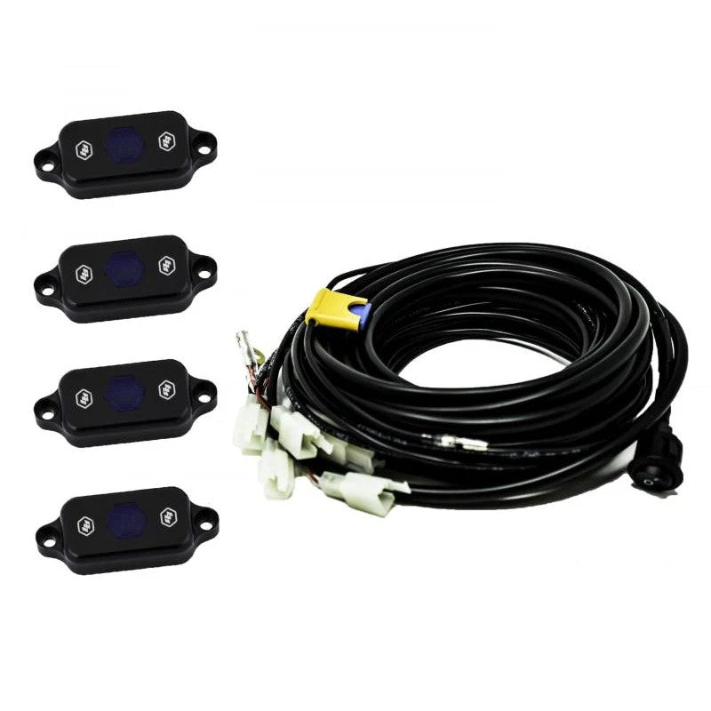 Baja Designs blue LED rock light pod with mounting hardware and electrical leads.