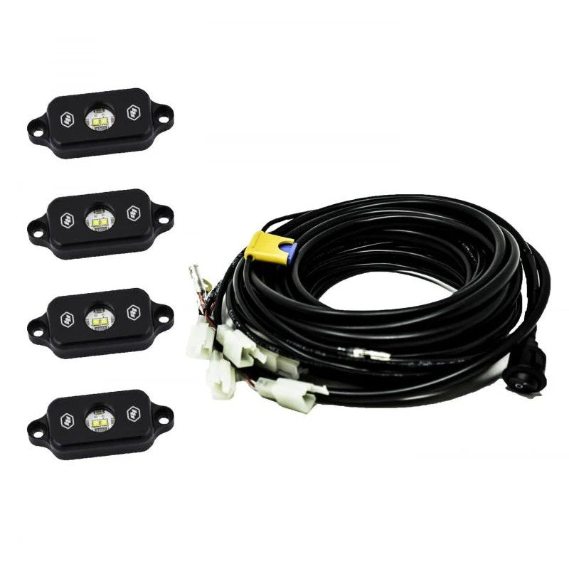 Baja Designs universal red LED rock light with mounting hardware and wiring harness.