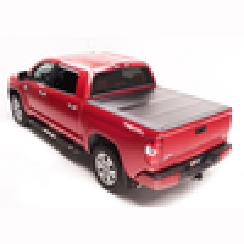 BAKFlip G2 semi-gloss black aluminum hard folding tonneau cover installed on a 2005-2015 Toyota Tacoma 6ft bed