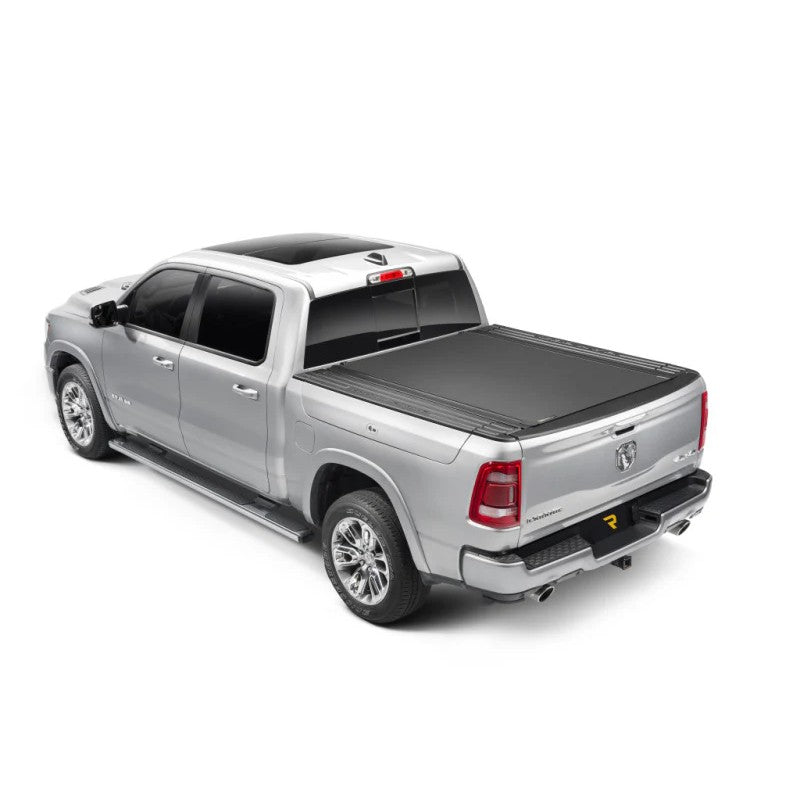 BAK Revolver X4s matte black hard roll-up tonneau cover on a Ram truck with RamBox and 6.4ft bed