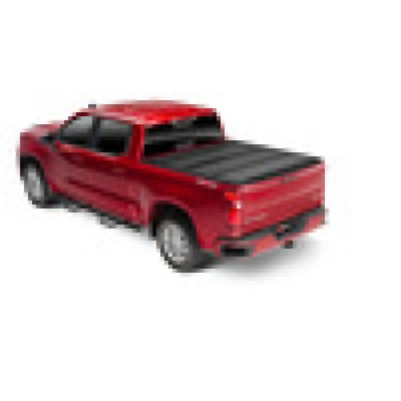 BAK BAKFlip MX4 matte black hard folding truck bed cover installed on a Chevrolet Silverado with a 5ft 8in bed.