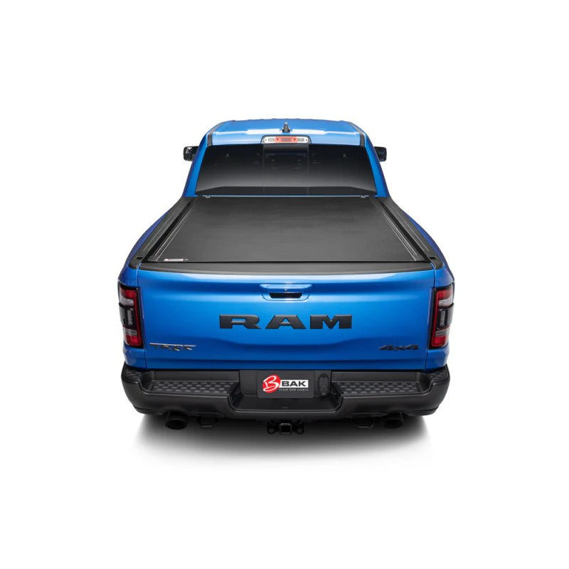 BAK Revolver X2 hard rolling truck bed cover on a 2019-2026 Ram 1500 showing aluminum slats and vinyl finish.