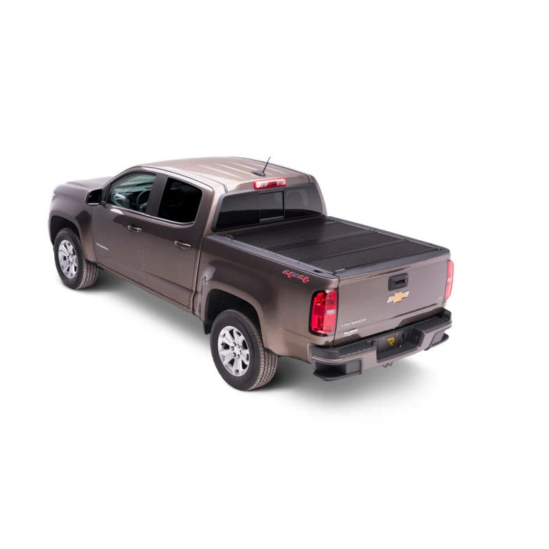 BAK BAKFlip G2 semi-gloss black hard folding truck bed cover installed on a Jeep Gladiator with a 5ft bed