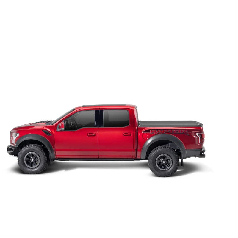 BAK Revolver X4s matte black hard rolling tonneau cover installed on a 2024-2026 Toyota Tacoma 6ft bed.