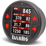 Banks Power iDash Pro 52mm digital gauge showing multi-parameter data display and mounting hardware.