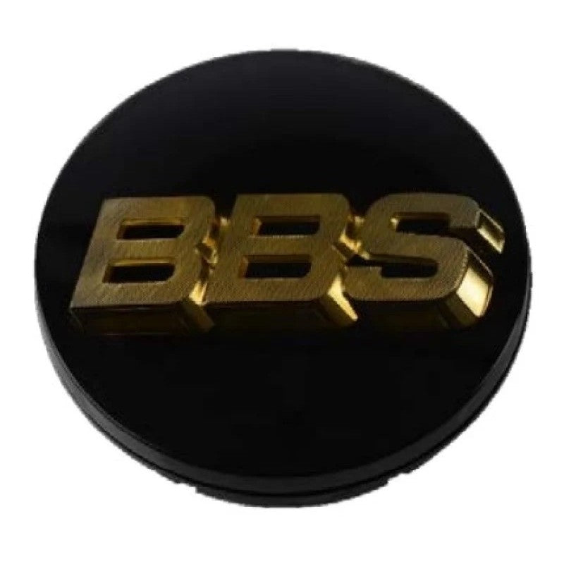 Authentic BBS 70.6mm wheel center cap in black with gold logo and 3-tab mounting rear view.