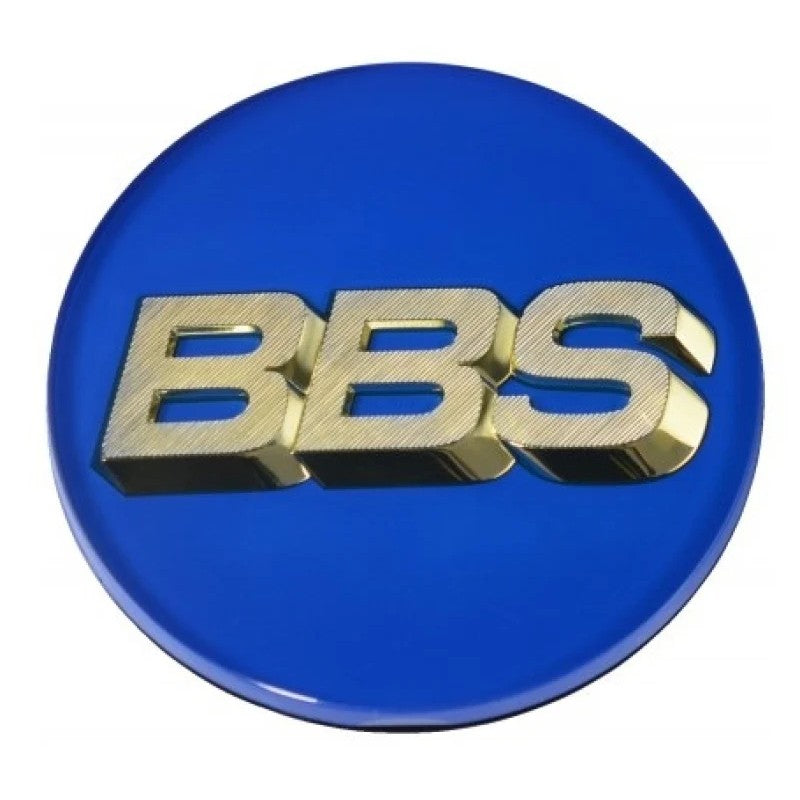 BBS 70.6mm wheel center cap featuring a blue background and gold 3D logo with a 4-tab rear mounting system.