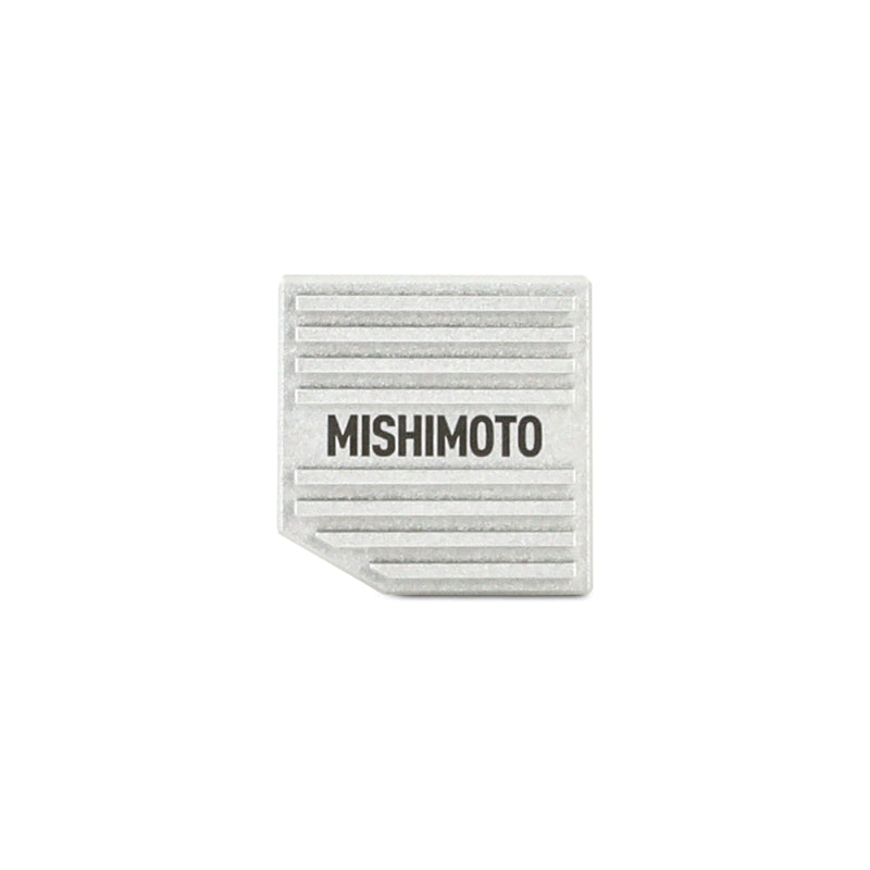Mishimoto silver CNC-machined aluminum full-flow transmission thermal bypass valve housing.