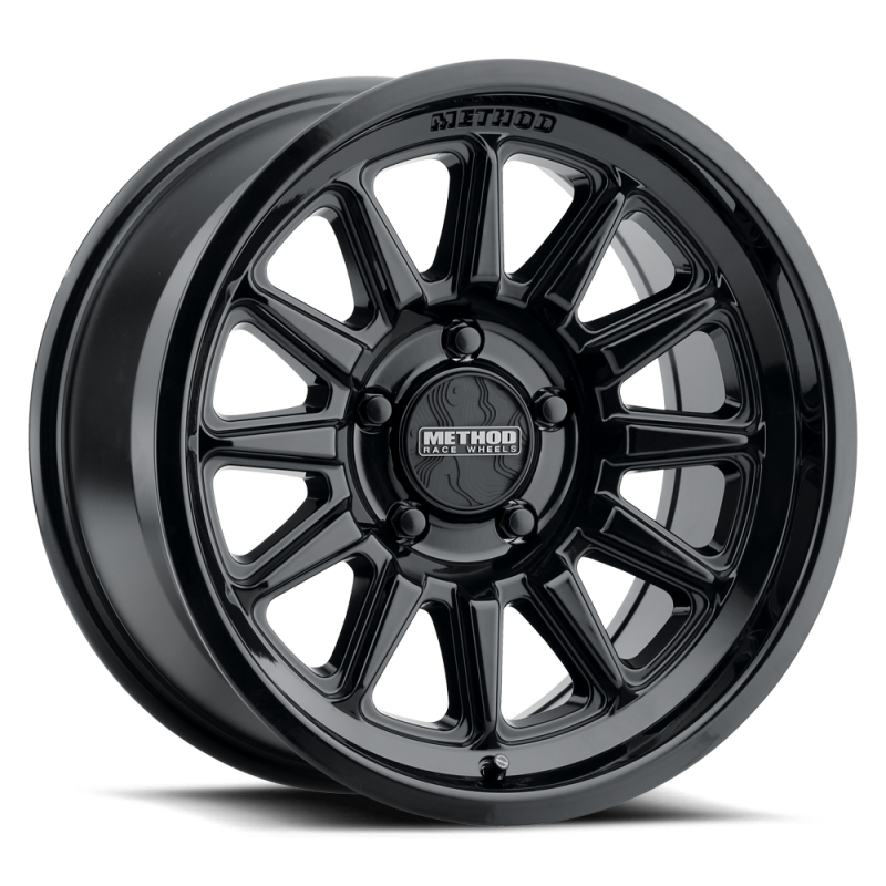 Method MR323 gloss black 17x8.5 wheel with 12-window design and 8x180 bolt pattern