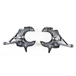 Pair of Belltech black powder-coated 2-inch drop spindles for GM S-series and G-body vehicles.