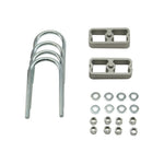 Belltech 1-inch extruded aluminum lowering blocks with 2-degree taper, U-bolts, and Grade 8 mounting hardware.