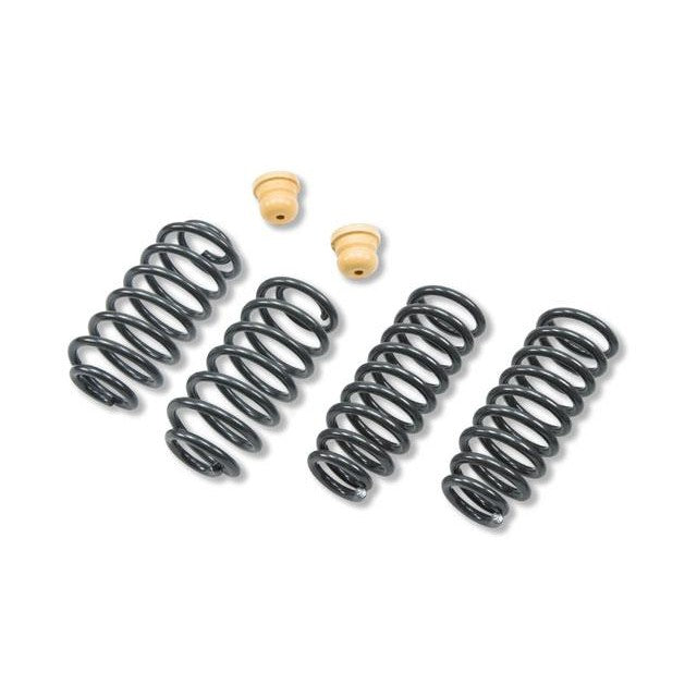 Belltech 795 suspension lowering kit components including hardware and alignment pieces, shown without shocks.