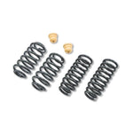 Belltech 795 suspension lowering kit components including hardware and alignment pieces, shown without shocks.