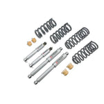 Belltech Street Performance lowering kit featuring four silver shock absorbers, black lowering components, and hardware.