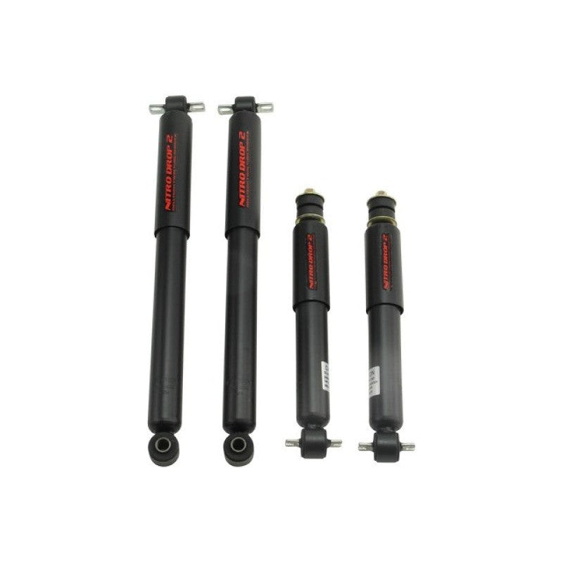 Belltech Nitro Drop 2 twin-tube shock absorber featuring a white finish, steel dust cover, and rubber bushings.