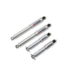 Belltech Street Performance twin-tube lowering shocks with silver finish and black vulcanized rubber bushings.
