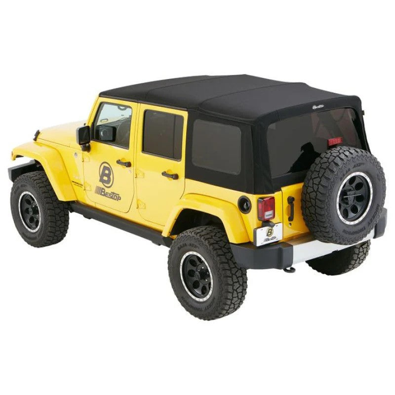 Bestop Supertop soft top in Premium Black Twill with Sunrider panel on a 4-door Jeep Wrangler JK.