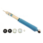 Bilstein B6 4600 Series 46mm monotube rear shock absorber with yellow finish and blue dust boot.