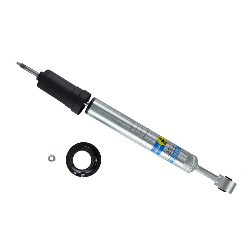 Zinc-plated Bilstein B8 5100 front monotube shock absorber for Toyota Hilux featuring adjustable snap-ring grooves.