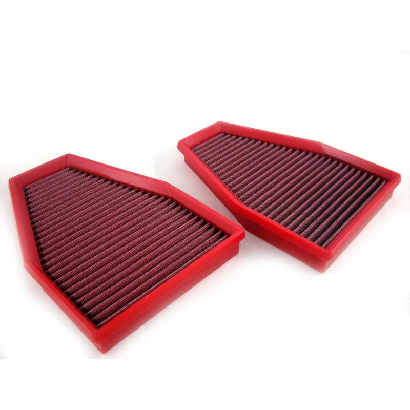 BMC high-performance red cotton gauze replacement panel air filters with black rubber frames and alloy mesh.