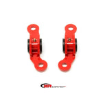 Red powdercoated BMR rear upper control arm bushing kit with Delrin inserts and zinc-coated hardware for Camaro and G8.