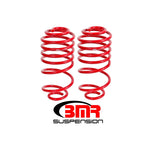 Pair of red BMR Suspension rear lowering springs for 1978-1987 Buick Regal, Chevy Monte Carlo, and GM G-Body vehicles.
