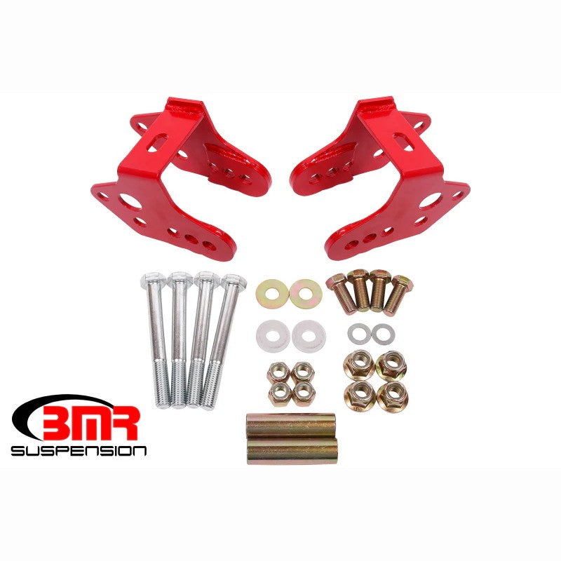 Red powder-coated heavy-duty steel control arm relocation brackets for 1979-2004 Ford Mustang.