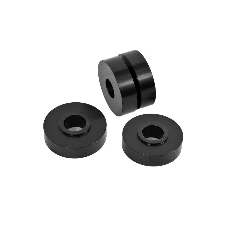 Two black anodized 6061 billet aluminum solid motor mount bushings for BMR K-members and mounts