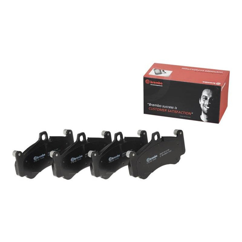 Brembo Premium NAO Ceramic rear brake pad set with multi-layer noise-reducing shims.