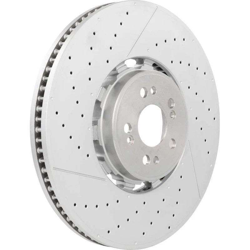 Brembo UV coated silver front brake rotor showing the high-carbon cast iron finish and vented design.