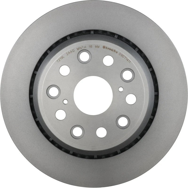 Brembo UV Coated silver front brake rotor featuring high-carbon cast iron and precision-machined mounting holes.