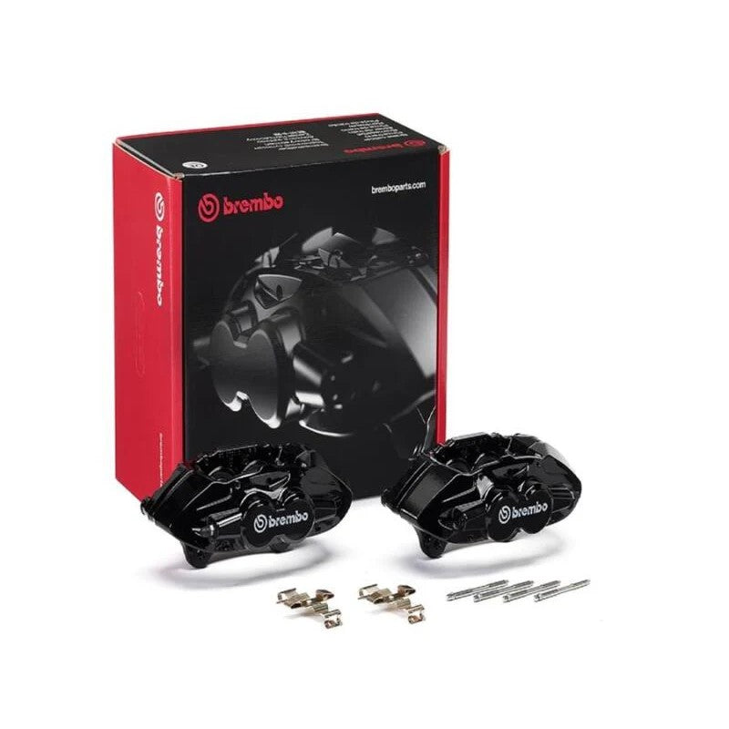 A pair of black Brembo X-Style hydraulic front brake calipers with installation springs and pins.