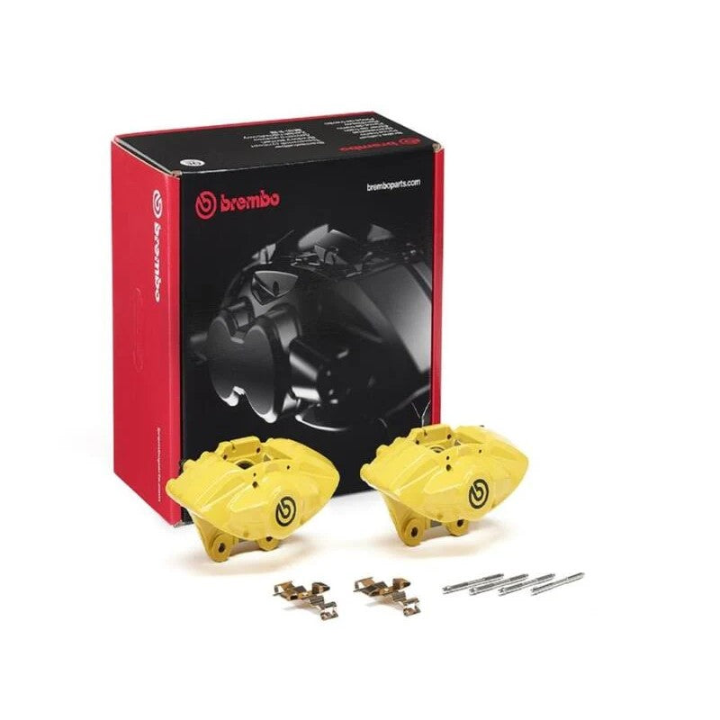 Pair of yellow Brembo X-Style hydraulic rear brake calipers with replacement pins and springs