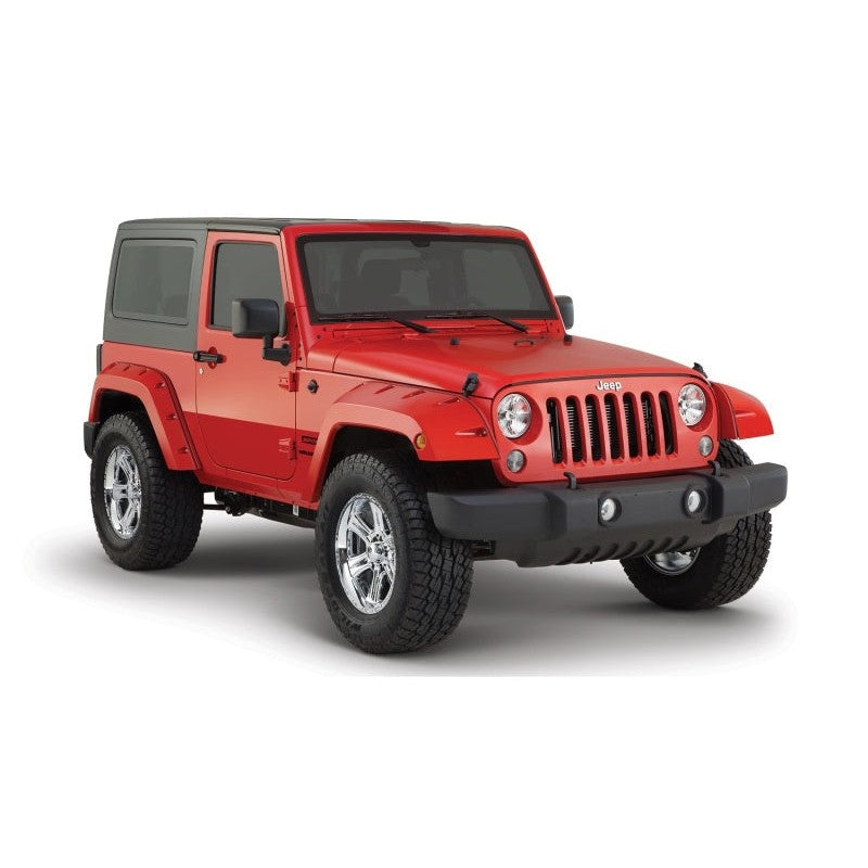 Bushwacker matte black Pocket Style fender flares installed on a 2007-2018 Jeep Wrangler JK 2-door.