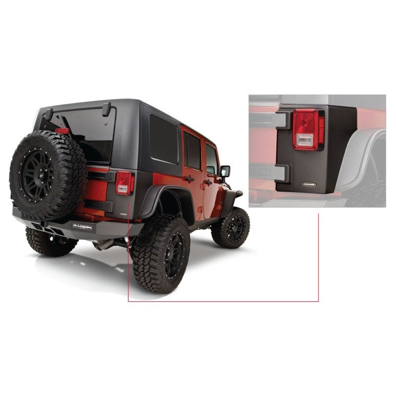 Bushwacker Trail Armor black TPO rear corner guards installed on a Jeep Wrangler JK Unlimited