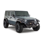 Bushwacker Pocket Style matte black fender flares with recessed stainless steel bolts for Jeep Wrangler JK Unlimited.