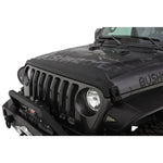 Matte black Bushwacker Trail Armor hood stone guard mounted on the front edge of a Jeep hood.