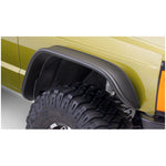 Bushwacker matte black Flat Style Fender Flares installed on a 1984-2001 Jeep Cherokee
