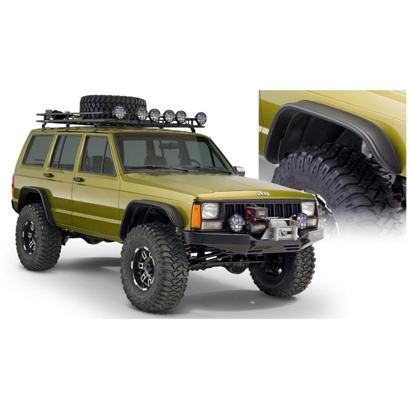 Bushwacker matte black Flat Style Fender Flares for 1984-2001 Jeep Cherokee XJ with LED side marker lights.