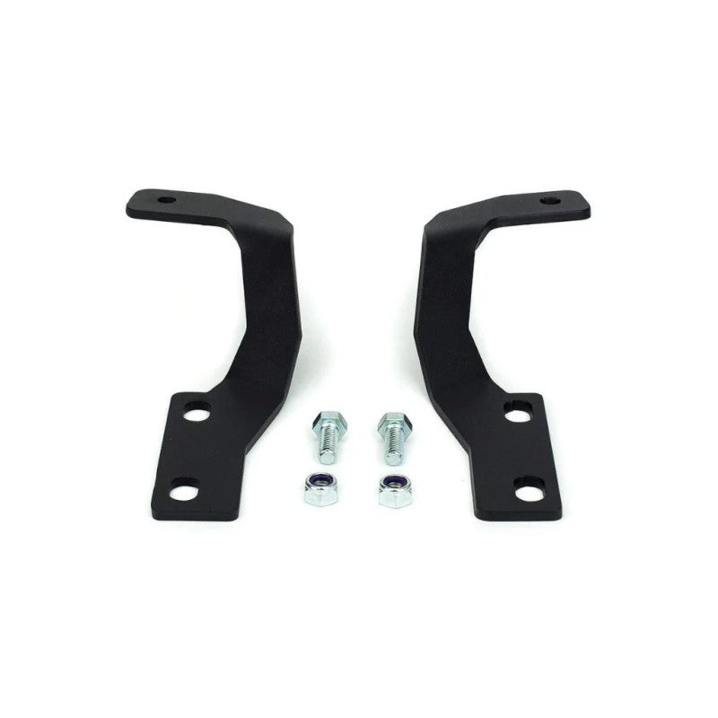 Cali Raised black powder-coated low profile ditch light brackets for 2010-2024 Toyota 4Runner hood hinges.
