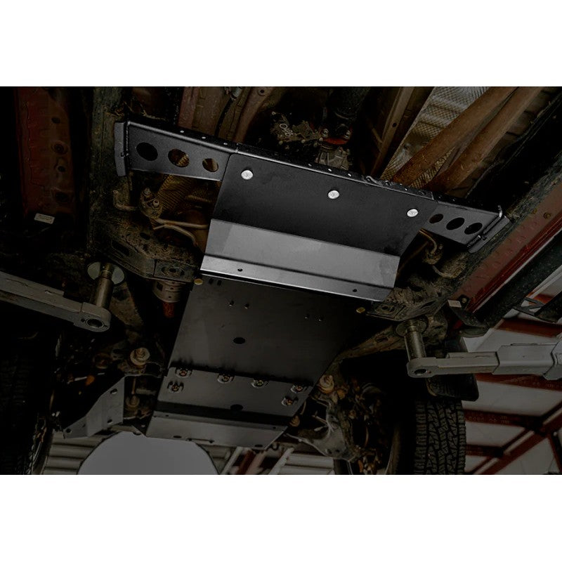 Black powder coated steel transfer case skid plate for 2016-2023 Toyota Tacoma with manual transmission.