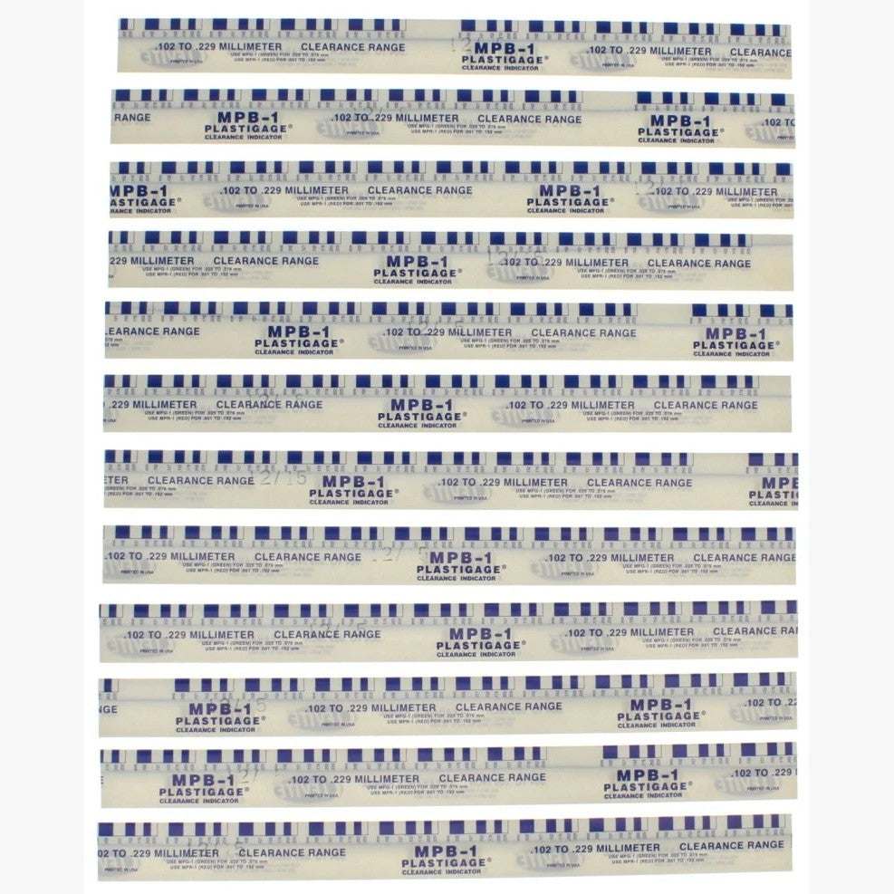 Twelve individual packages of Clevite Blue Plastigage strips for measuring engine bearing oil clearances.