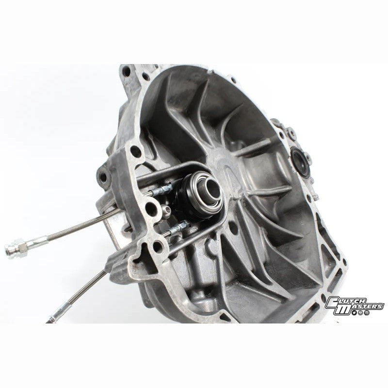 Clutch Masters N818-H internal hydraulic release bearing with hard anodized aluminum housing and steel braided lines.