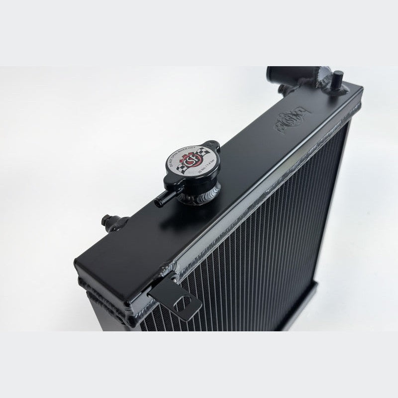 CSF 7228B black aluminum half-size performance radiator for Mitsubishi Lancer Evolution 7, 8, and 9.